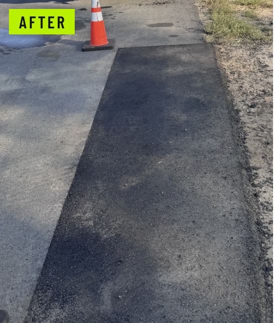 After: the same crossing replaced with a clean full-depth asphalt patch, edges tied into the existing road.