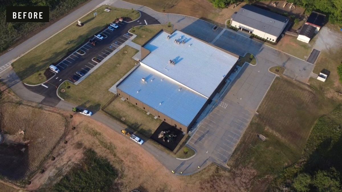Before: aerial view of a church campus with unfinished gravel drives and partially paved parking.